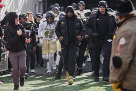 November 23 2023: Buffaloes coach Deion Sanders leading his team to the game with Colorado Buffaloes and Utah Utes held