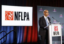 Executive Director of the NFLPA Lloyd Howell speaks at the National Football League Players Association press conference