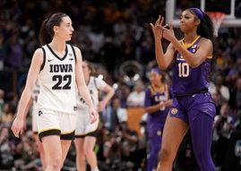 Syndication: USA TODAY Angel Reese (10) shows Iowa Caitlin Clark her ring finger during the final seconds of the women s