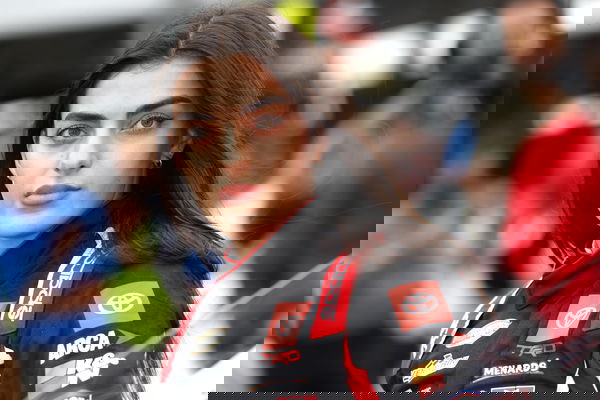 TALLADEGA, AL &#8211; APRIL 20: Toni Breidinger ( 25 Venturini Motorsports Raising Cane s Toyota) poses for pictures on pit ro