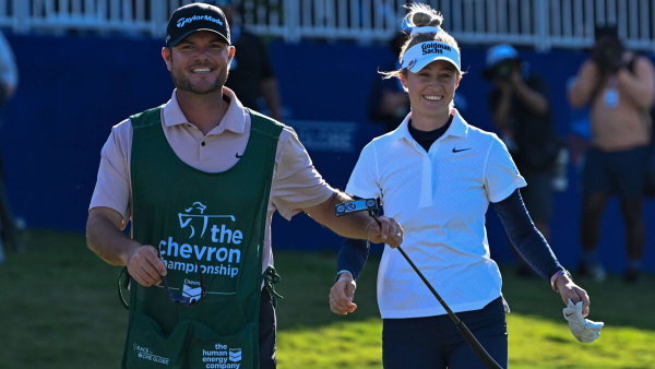 THE WOODLANDS, TX – APRIL 21: Nelly Korda (USA) celebrates with her caddie Jason McDede after winning the Chevron Champi