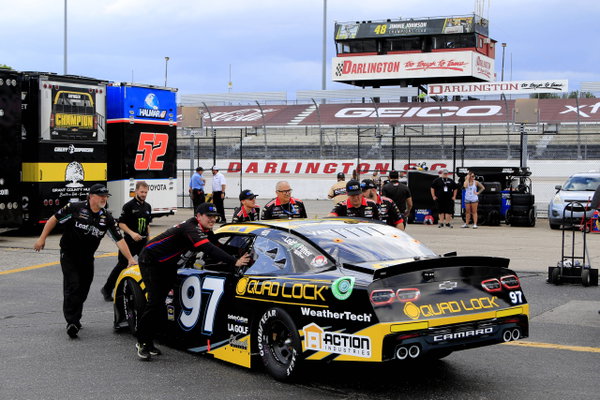 DARLINGTON, SC – MAY 10: The crew of Shane Van Gisbergen ( 97 Kaulig Racing Quad Lock Chevrolet) pushes the race car in