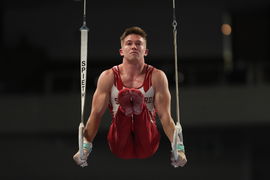 May 30, 2024, Fort Worth, Texas, USA: Stanford gymnast IAN GUNTHER warms up on the rings prior to the start of the Senio