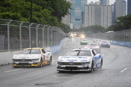 July 7, 2024, Chicago, Il, USA: NASCAR, Motorsport, USA Cup Series driver, Chris Buescher races for position for the Gra