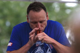 Syndication: El Paso Times Competitive eater Joey Jaws Chestnut ate 57 hot dogs in five minutes at Fort Bliss™ Pop Goes