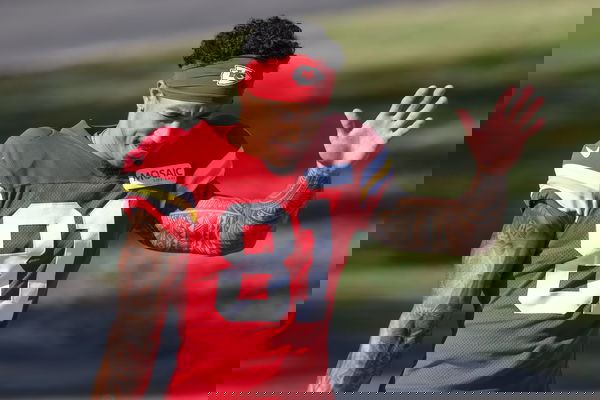 ST. JOSEPH, MO – AUGUST 02: Kansas City Chiefs Nikko Remigio (81) waves to fans during training camp on August 2, 2024 a
