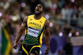 240804 Kishane Thompson of Jamaica reacts at the finish line of men™s athletics 100 meter final during day 9 of the Pari
