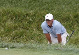 WHITE SULPHUR SPRINGS, WV &#8211; AUGUST 18: Smash GC s Captain Brooks Koepka surveys the slope of the 18th green during the f