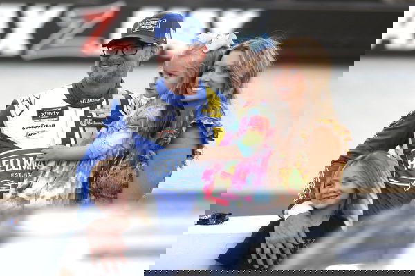 BRISTOL, TN &#8211; SEPTEMBER 20: Dale Earnhardt, Jr ( 88 JR Motorsports Hellmann s Chevrolet) poses for a picture with his wi