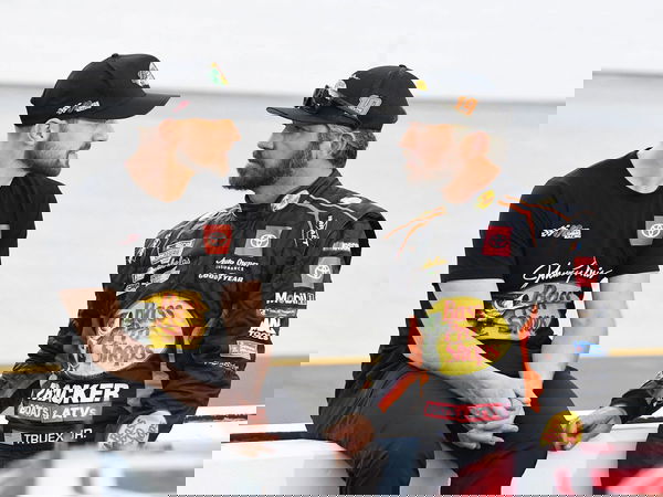 BRISTOL, TN – SEPTEMBER 21: James Small, crew chief for Martin Truex Jr ( 19 Joe Gibbs Racing Bass Pro Shops Toyota) tal