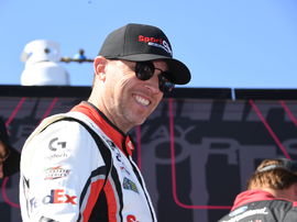 CHARLOTTE, NC &#8211; OCTOBER 13: Denny Hamlin ( 11 Joe Gibbs Racing Clips Haircuts Toyota) looks on prior to the running of t