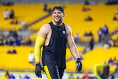 October 28, 2024, Hookstown, Pennsylvania, USA: Pittsburgh Steelers linebacker TJ WATT (90) smiles at his wife in the st