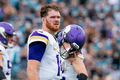 JACKSONVILLE, FL &#8211; NOVEMBER 10: Minnesota Vikings quarterback Sam Darnold (14) looks to the scoreboard as they review an