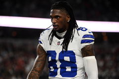 ARLINGTON, TX &#8211; NOVEMBER 18: Dallas Cowboys WR CeeDee Lamb watches action during game featuring the Houston Texans and t