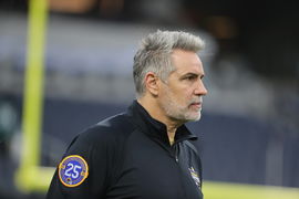 INGLEWOOD, CA &#8211; NOVEMBER 24: Los Angeles Rams quarterback Kurt Warner with 25th anniversary jacket from winning the supe