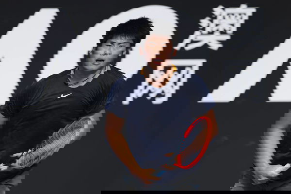 CHENGDU, CHINA &#8211; NOVEMBER 27: Li Wenfu of China reacts in the Men s Singles Round of 16 match against Sun Fajing of Chin