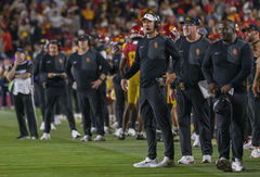Trojans Defeat Wolverines, 31-13