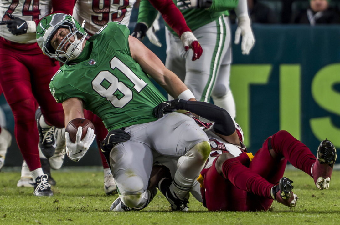 Philadelphia Eagles tight end Grant Calcaterra 81 winces in pain and is injured after being brought down by Washington Commanders safety Jeremy Reaves 39 with a hip drop tackle during the NFL, American Football Herren, USA football matchup between the Washington Commanders and the Philadelphia Eagles at Lincoln Financial Field in Philadelphia, Pennsylvania on January 4, 2026.