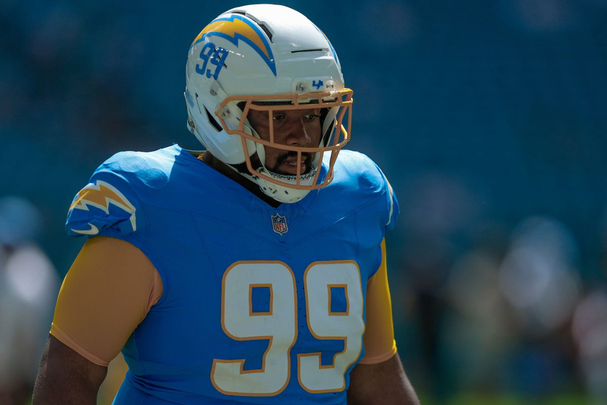 MIAMI GARDENS, FL - OCTOBER 12: Defensive Tackle Jamaree Caldwell 99 of the Los Angeles Chargers looks on during the game warm up prior to the game between the Los Angeles Chargers and the Miami Dolphins, on Sunday October 12, 2025, at Hard Rock Stadium in Miami Gardens, FL.Photo by Chris Arjoon/Icon Sportswire NFL, American Football Herren, USA OCT 12 Chargers at Dolphins EDITORIAL USE ONLY Icon25101200161