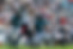 Jacksonville Jaguars linebacker Devin Lloyd 0 and defensive end Josh Hines-Alle