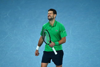 Novak Djokovic lets out a grunt after missing a point