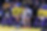 Lakers players on bench
