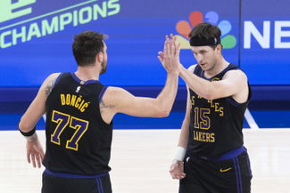 March 10, 2026, Los Angeles, California, USA: Los Angeles LakersÃââ Austin Reaves 15 celebrates with Luka DonÄÂiÄ 77 after hitting a 3-point shot against the Minnesota Timberwolves during an NBA, Basketball Herren, USA basketball game at Crypto.com Arena on Tuesday, March 10, 2026 in Los Angeles. Los Angeles USA - ZUMAc68_ 20260310_zaf_c68_049 Copyright: xRingoxChiux
