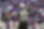 Image for NFL Referee Erupts at Vikings Star Eric Wilson After Accidental Collision During
Dolphins Game