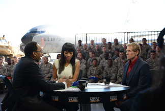 Airmen with the 108th Wing attend a special live broadcast of ESPNs First Take hosted by Stephen A. Smith, Skip Bayless and Cari Champion, Nov. 10, 2014, at Joint Base McGuire-Dix-Lakehurst, N.J. The Salute the Troops broadcast in honor of Veterans Day was set with a backdrop of a KC-10 Extender and KC-135 Stratotanker, and various other military vehicles. Copyright: xpiemagsx milflic16082021 8295 ACHTUNG AUFNAHMEDATUM GESCHÄTZT
