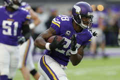 MINNEAPOLIS MN DECEMBER 18 Minnesota Vikings Running Back Adrian Peterson 28 warms up prior to