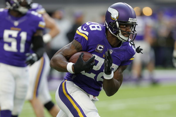 MINNEAPOLIS MN DECEMBER 18 Minnesota Vikings Running Back Adrian Peterson 28 warms up prior to