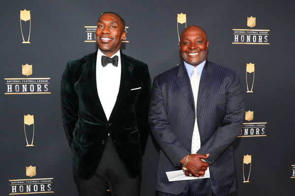 MINNEAPOLIS MN FEBRUARY 03 Shannon Sharpe and Sterling Sharpe pose for Photographs on the Red Ca
