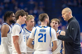 October 29, 2024: Kentucky head coach Mark Pope speaks with, from left, Ansley Almonor, Trent Noah, Collin Chandler, Wal