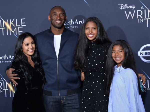 Former NBA player Kobe Bryant, his wife Vanessa (L) and their daughters Natalia and Gianna (R) attend the premiere of t