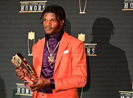 Lamar Jackson receiving the MVP award