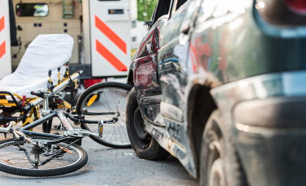 Accident Car Crash With Bicycle On Road