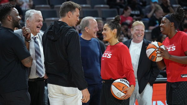 Kelsey Plum and Tom Brady