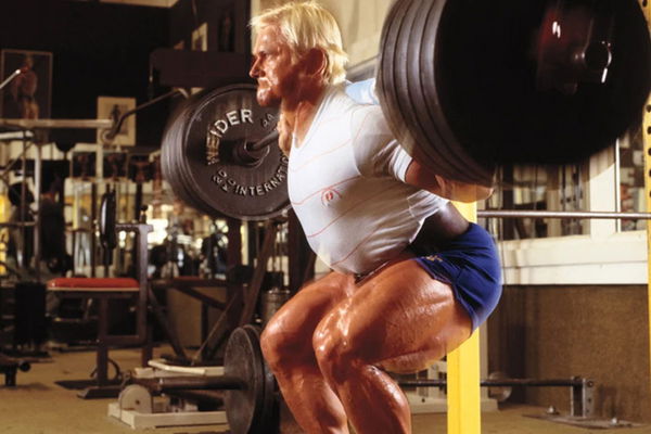 Arnold Schwarzenegger Quote: “I do squats until I fall over and