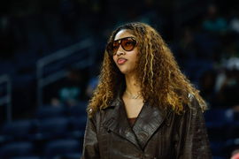 Injured Chicago Sky forward Angel Reese (5) stands on the sidelines before a WNBA game against the New York Liberty.